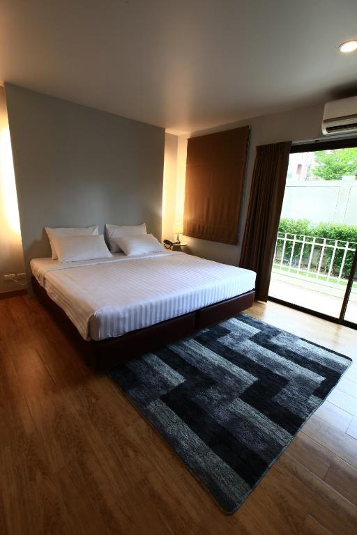 The One Residence Hotel Bangkok Rum bild